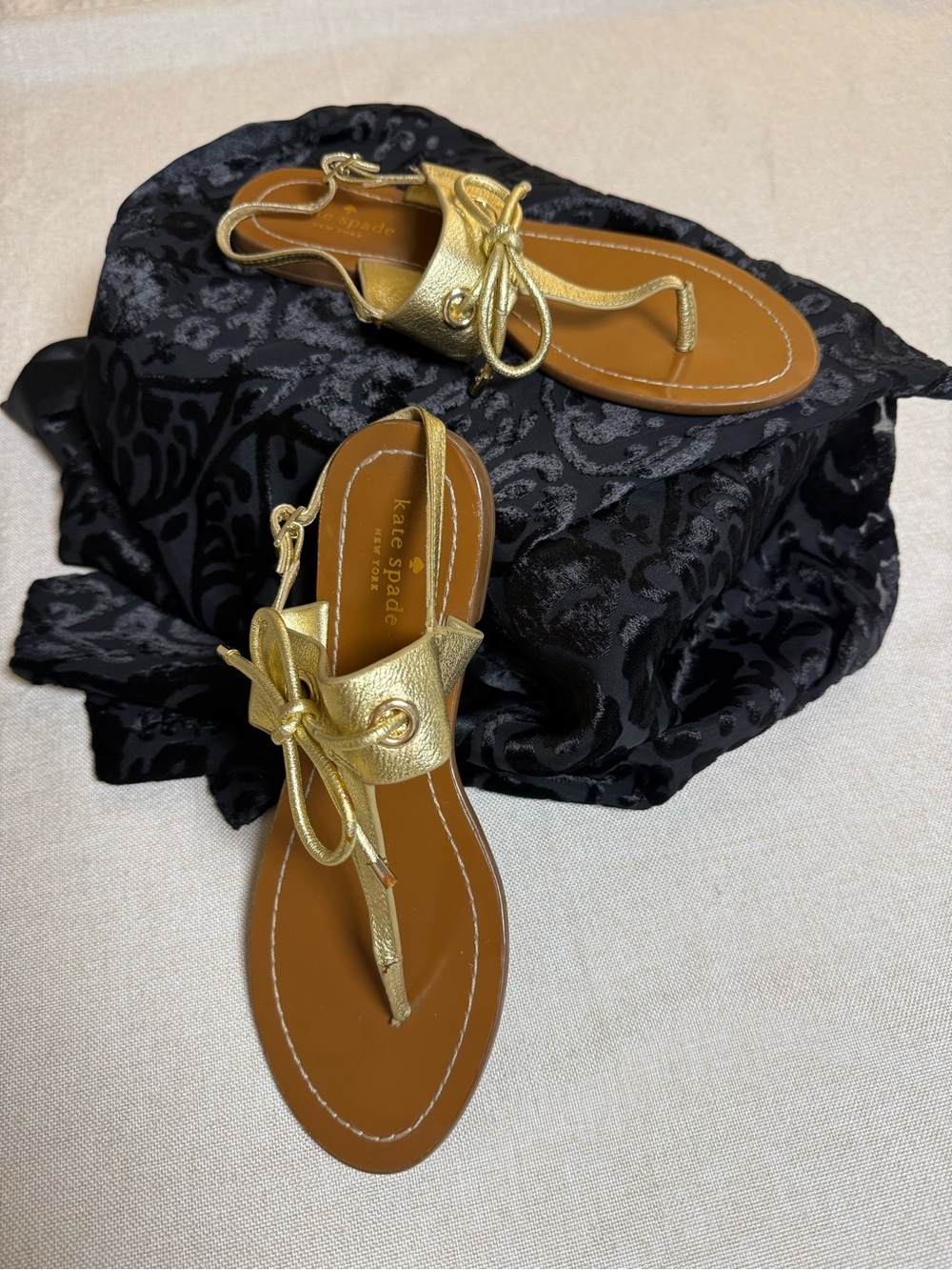 kate spade Gold Leather Bow T-Strap Sandals